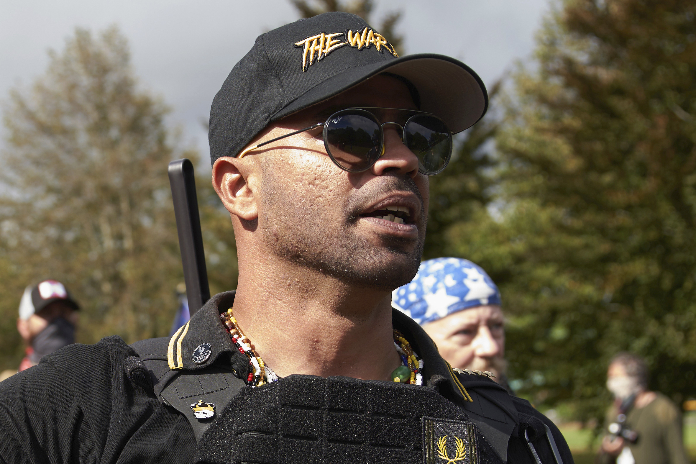 FILE - Proud Boys leader Enrique Tarrio speaks at a rally in Delta Park on Sept. 26, 2020, in Portl...