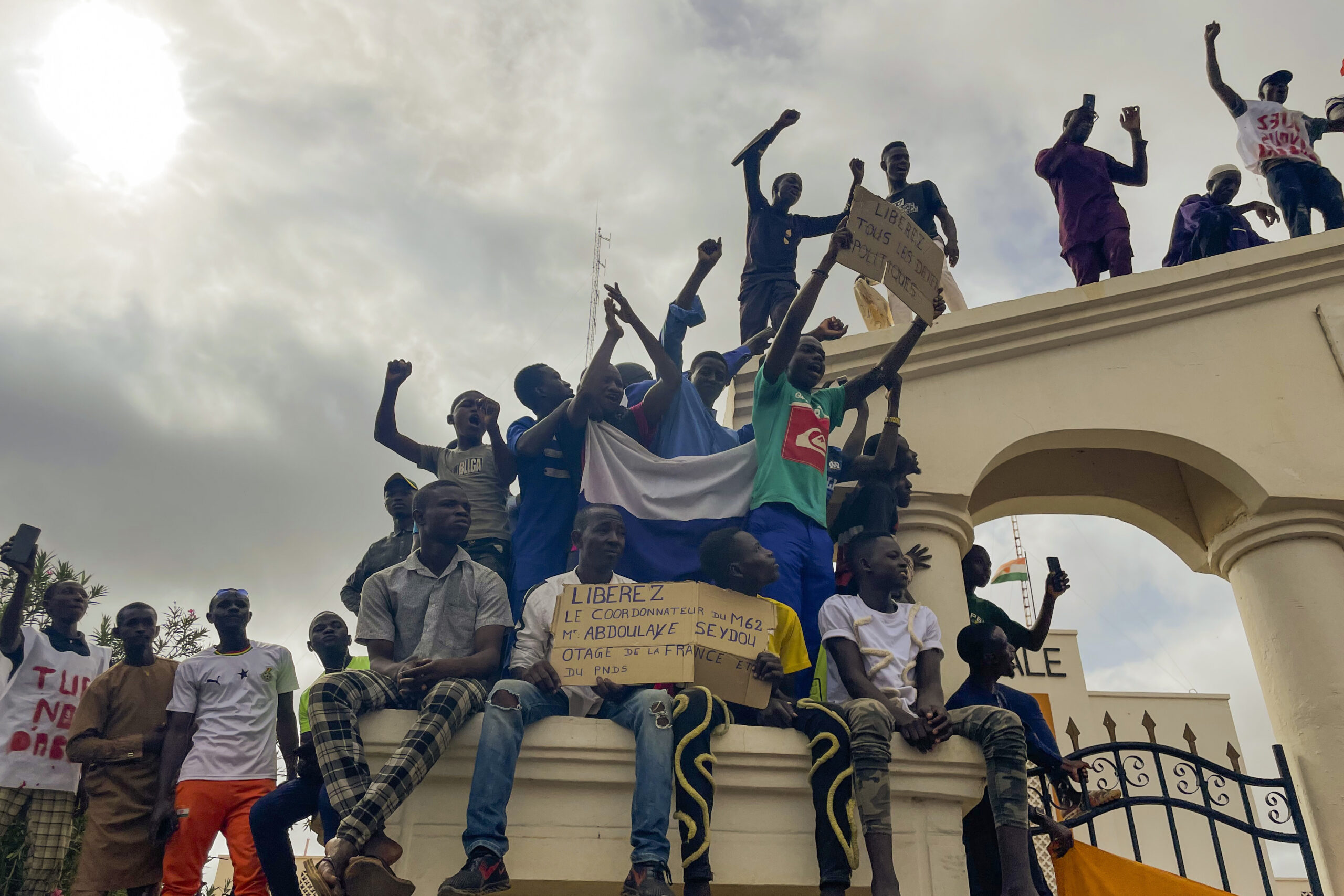 FILE - Supporters of Niger's ruling junta gather at the start of a protest called to fight for the ...