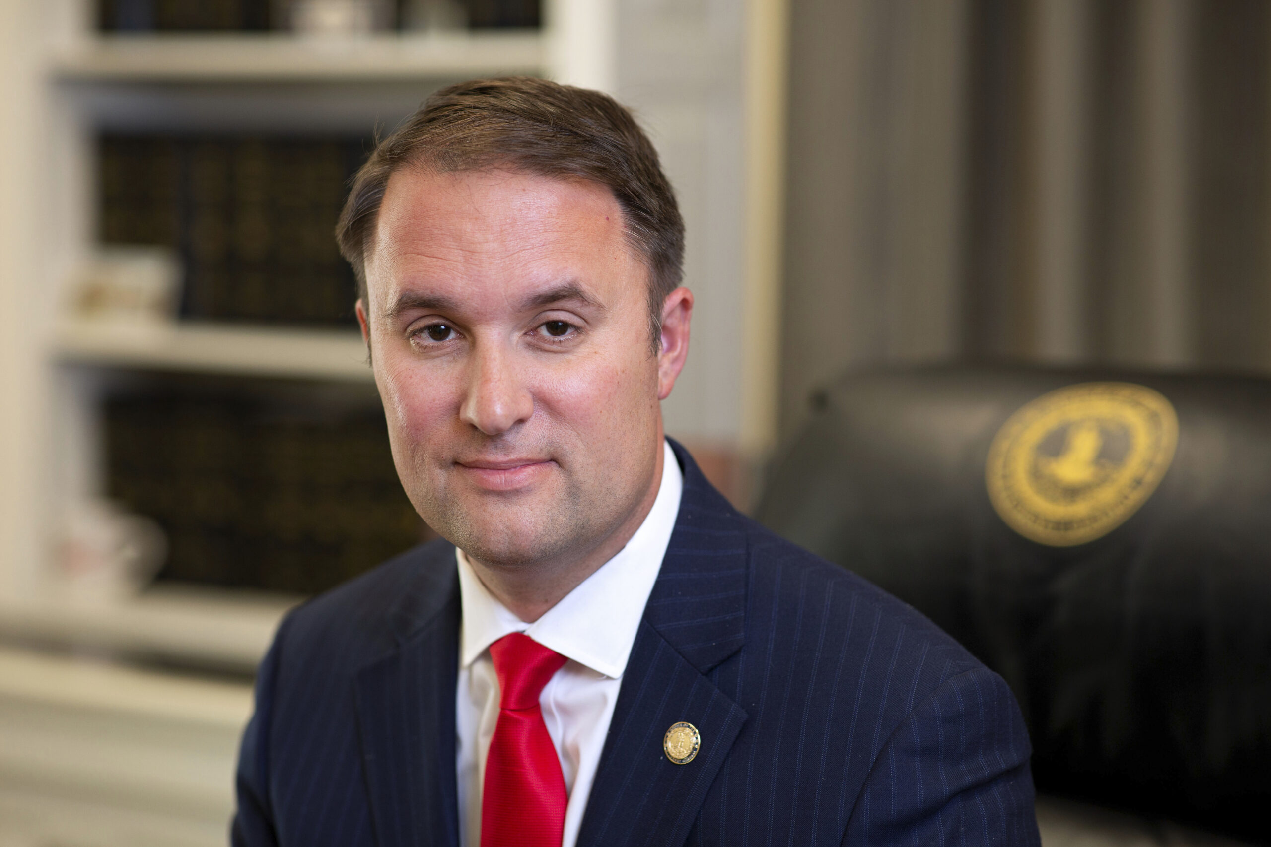FILE - Virginia Attorney General Jason Miyares sits for a portrait in his office, May 9, 2023, in R...