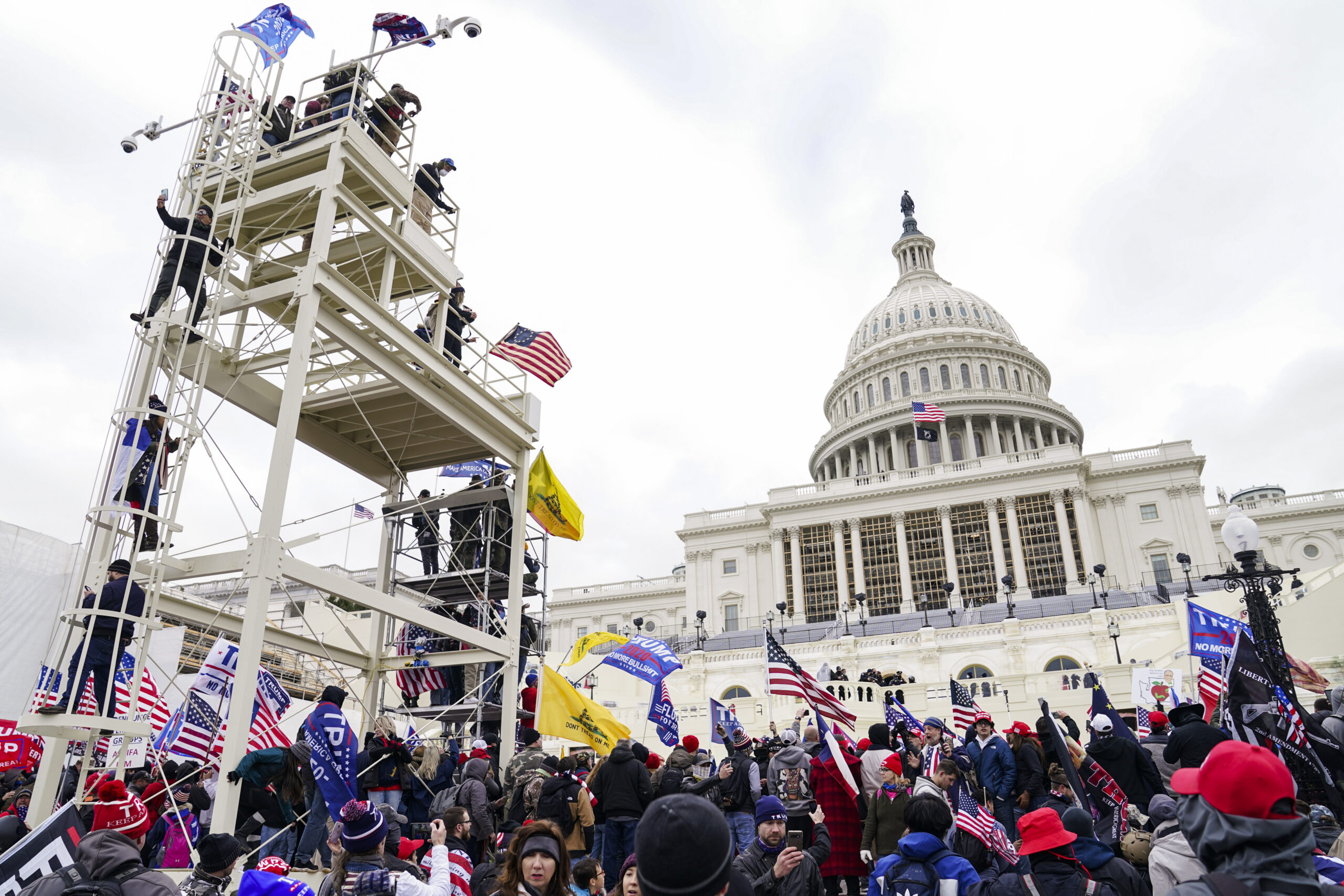 FILE - Violent insurrectionists loyal to President Donald Trump breach the U.S. Capitol in Washingt...