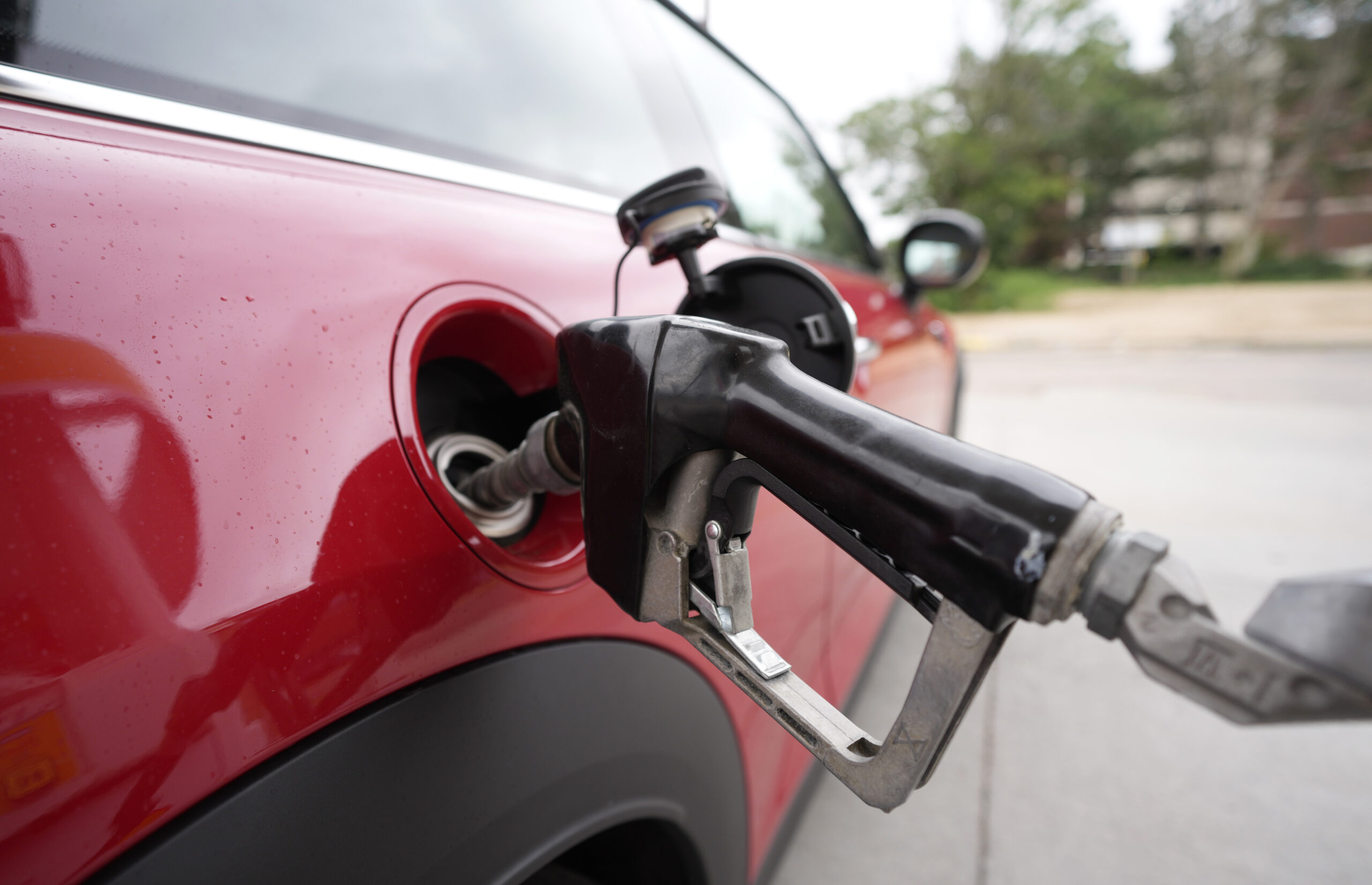 A motorist fills up the tank of a vehicle at a Shell station Wednesday, July 5, 2023, in Englewood,...