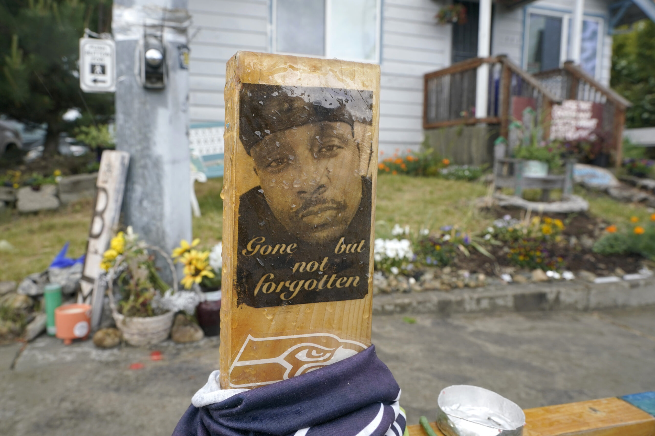 FILE - A sign is displayed on May 27, 2021, at a memorial in Tacoma, Wash., where Manuel "Manny" El...