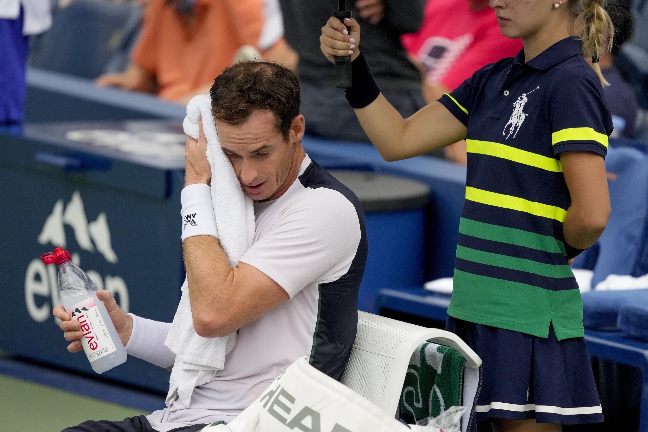 FILE - Andy Murray, of Britain, wipes sweat from his brow during a break in play against Corentin, ...