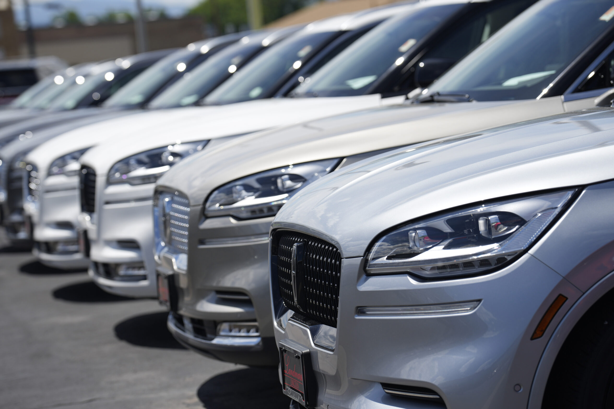 File - Unsold 2023 Aviator sports-utility vehicles sit in a long row at a Lincoln dealership on Jun...