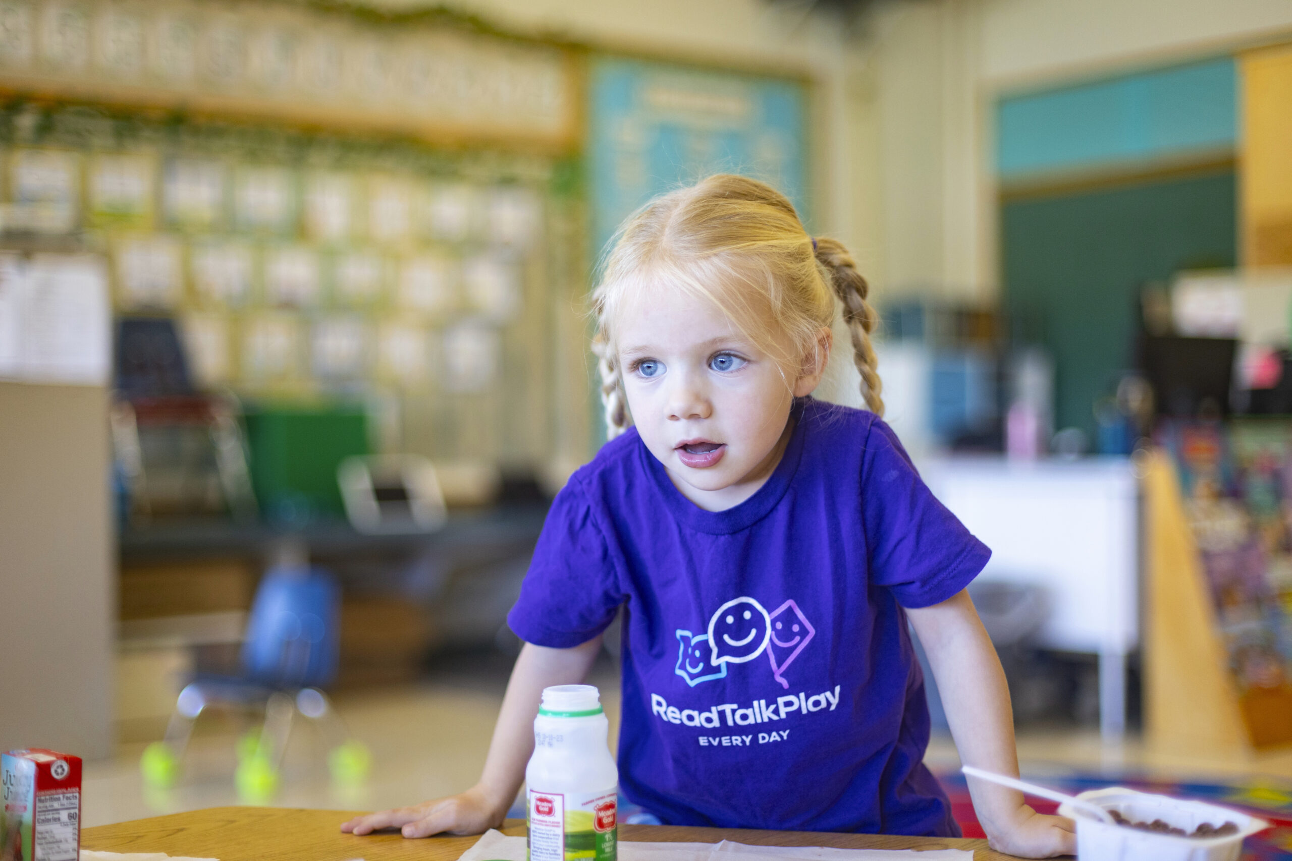 Emery Lankford, a 4-year-old preschooler at Hillcrest Developmental Preschool, takes a break from s...
