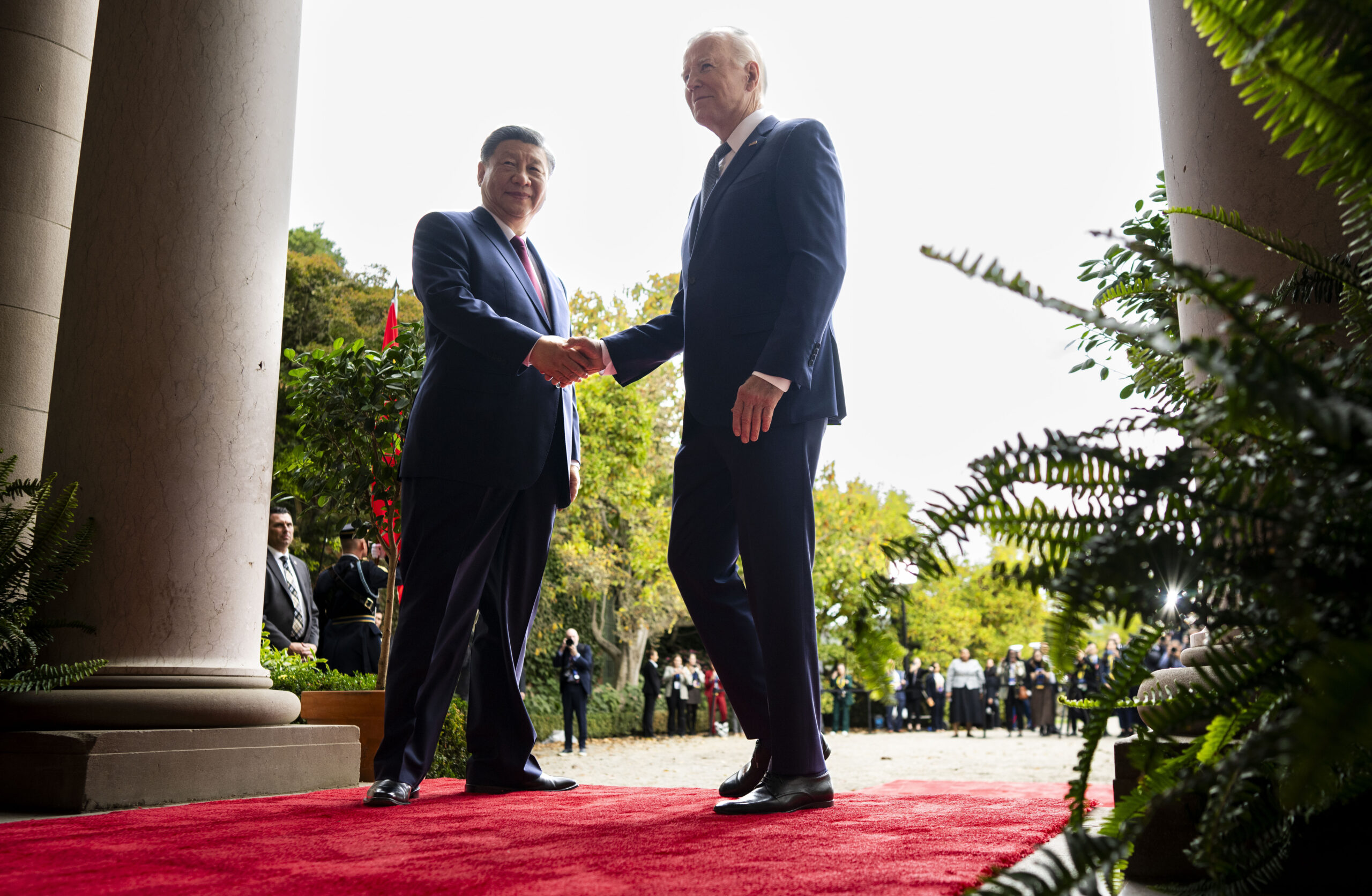 FILE - President Joe Biden greets China's President President Xi Jinping at the Filoli Estate in Wo...