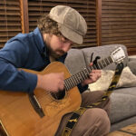 Jon Pontrello performing a special live version of his song "The Bellwether Sheep of the Mosquito Fleet" for KIRO Newsradio in late 2023. (Feliks Banel/KIRO Newsradio)