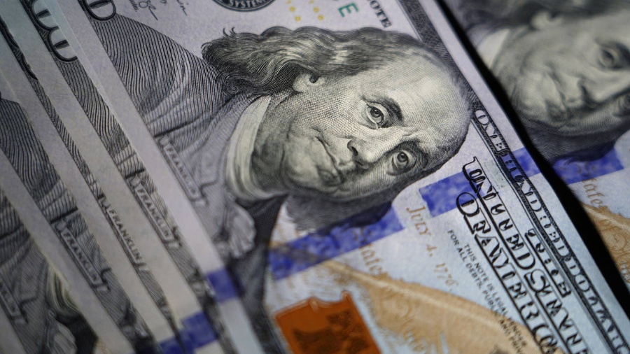 Image: The likeness of Benjamin Franklin is seen on U.S. $100 bills in 2022, in Marple Township, Pe...