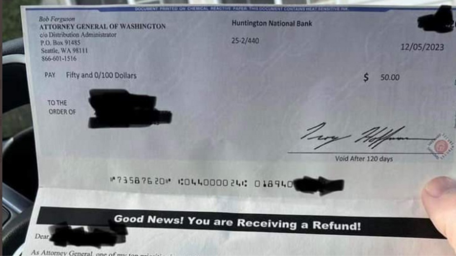 Image: A photo of a refund check sent out posted online by Toby Nixon....