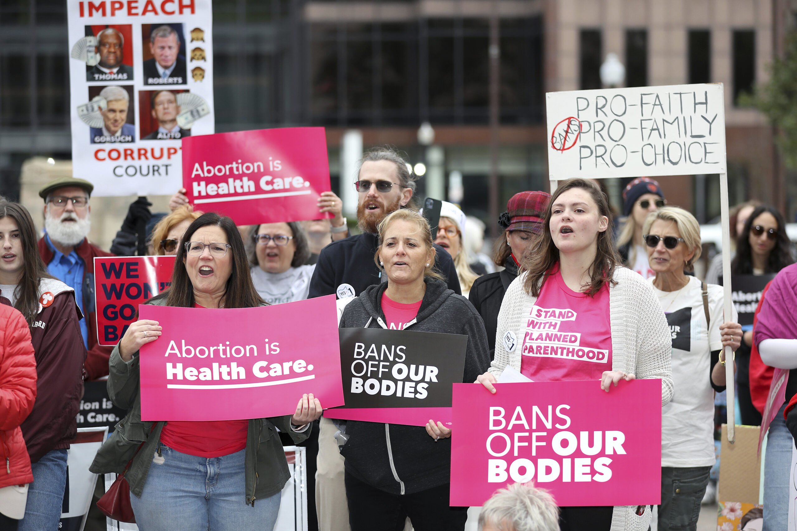 FILE - Supporters of Issue 1, the Right to Reproductive Freedom amendment, attend a rally in Columb...