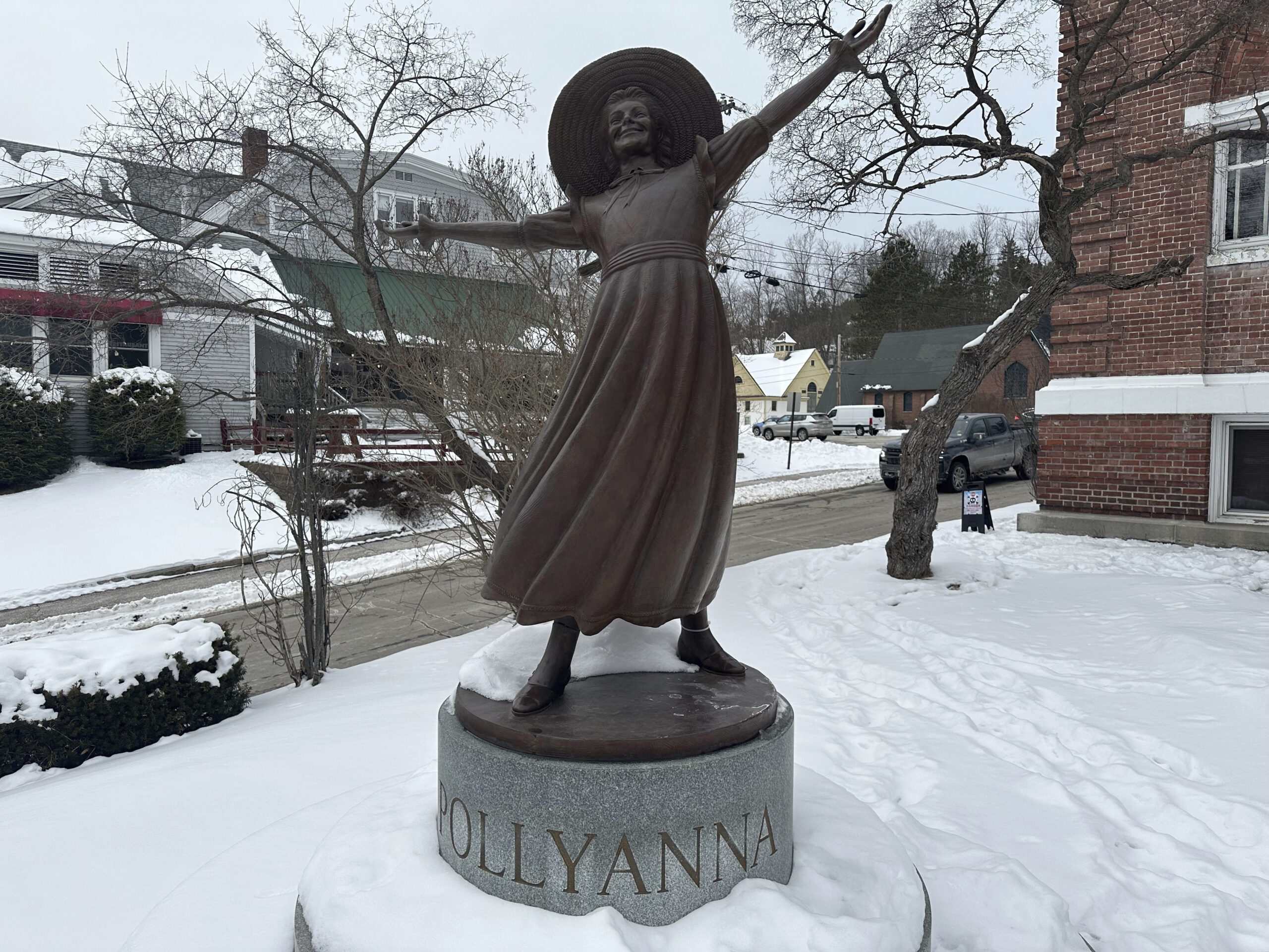 A bronze statue of Pollyanna sits outside the Littleton public library to honor the 1913 book by lo...