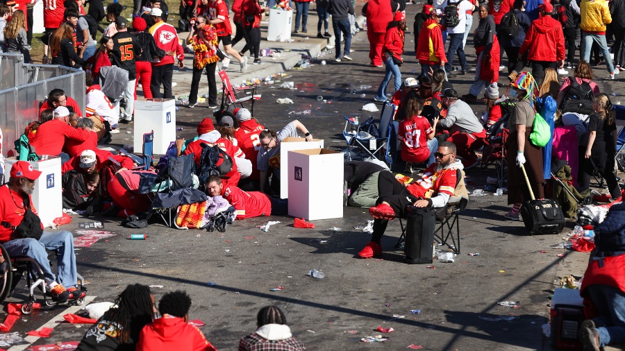 Image: People take cover during a shooting at Union Station during the Kansas City Chiefs Super Bow...