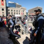 Image: Law enforcement responds to a shooting at Union Station during the Kansas City Chiefs Super Bowl LVIII victory parade on February 14, 2024 in Kansas City, Missouri. At least 8-10 people were shot and two people were detained after a rally celebrating the Chiefs Super Bowl victory.