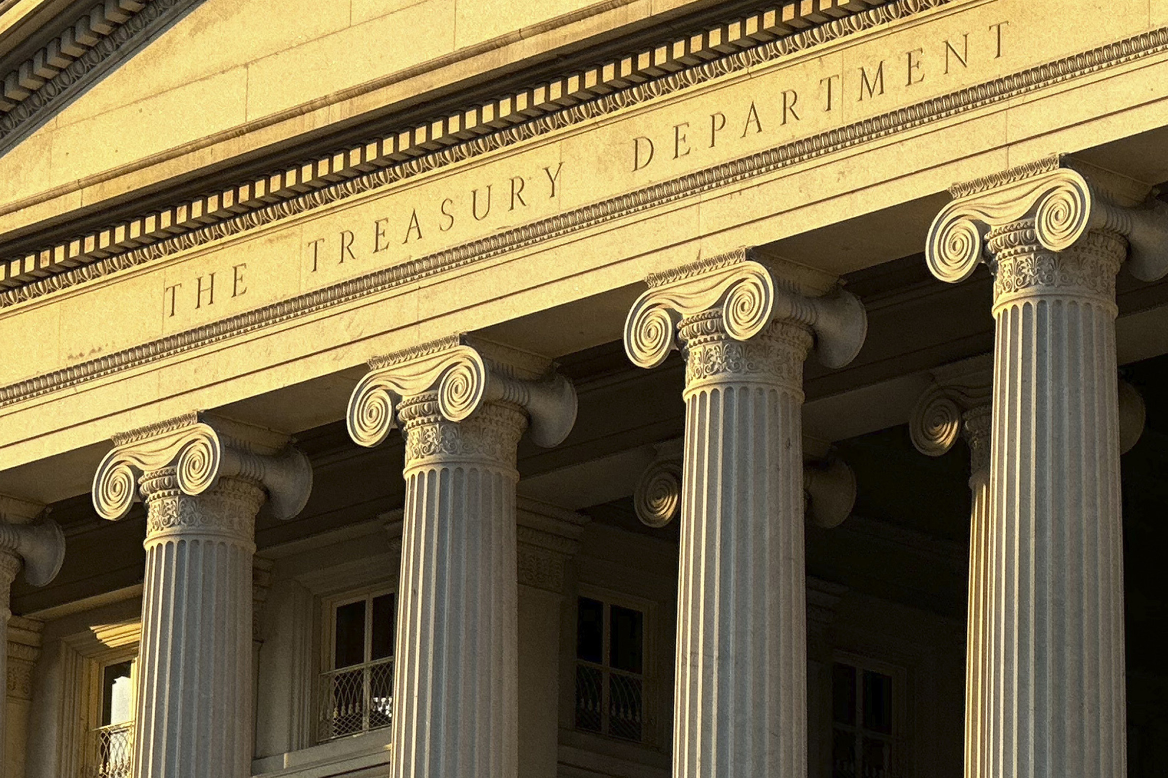 FILE - The Treasury Department is seen near sunset in Washington, Jan. 18, 2023. The Treasury Depar...