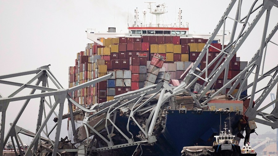 Image: A cargo ship is stuck under the part of the structure of the Francis Scott Key Bridge after ...