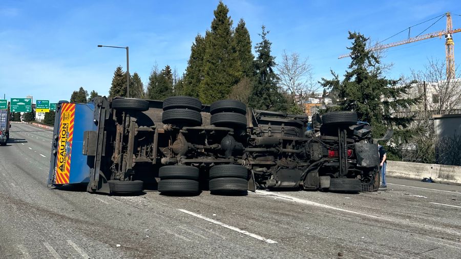 An overturned semi-truck blocked I-90 west.  All lanes are now open. (Photo: MyNorthwest staff)...