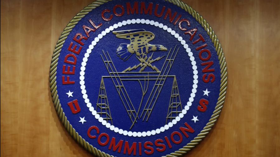 Photo: The seal of the Federal Communications Commission (FCC) is seen before an FCC meeting to vot...