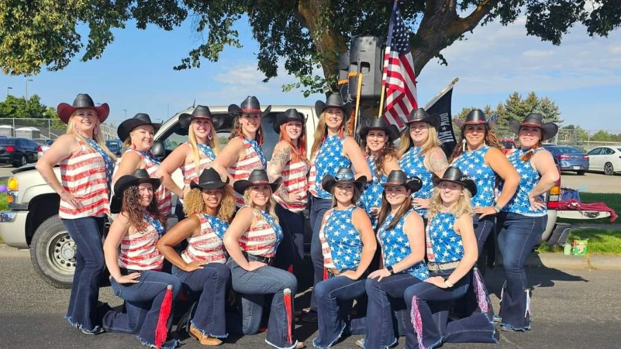 Photo: A dance troupe says it was unwelcome at an event after wearing American flag shirts. They sa...