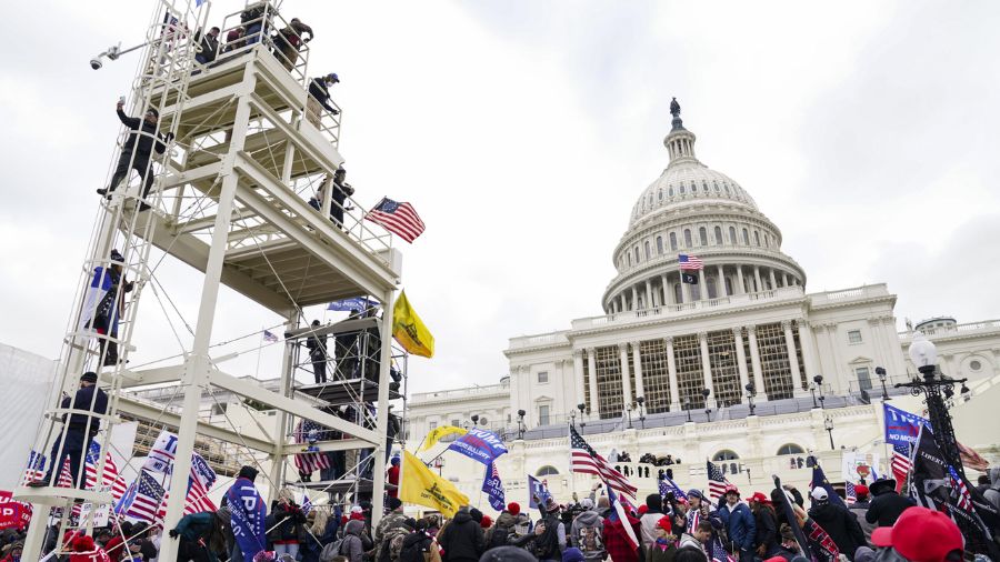 Photo: Violent insurrectionists loyal to President Donald Trump breach the U.S. Capitol in Washingt...