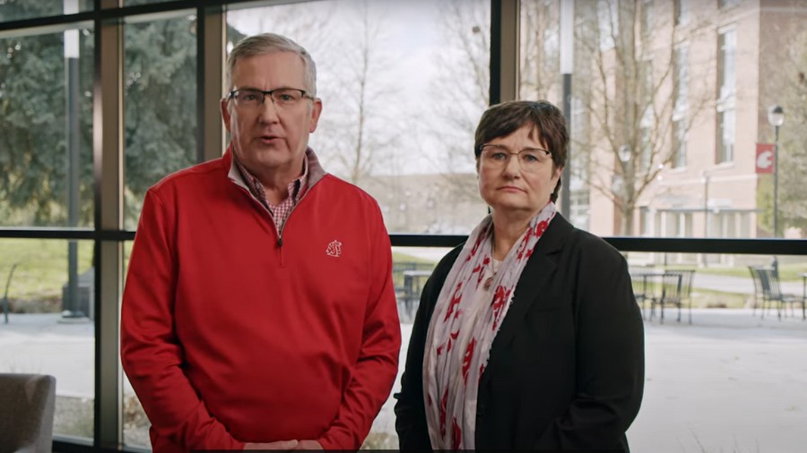 Washington State University (WSU) President Kirk Schulz, left, and his wife Noel Schulz speak durin...