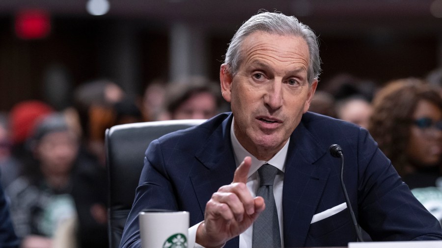 Image: Starbucks founder and former CEO Howard Schultz testifies on Capitol Hill in Washington, D.C...