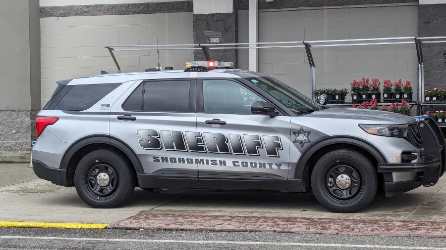 Image: A Snohomish County Sheriff's vehicle is seen in Lynnwood in March 2024. Agency robbery and b...