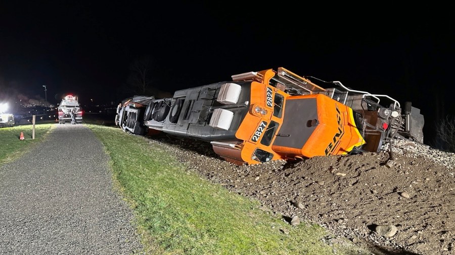 Image: This photo provided by the Washington Department of Ecology shows a derailed BNSF train on t...