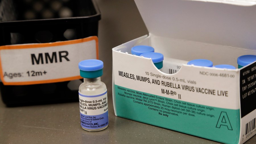 Image: A dose of the measles, mumps and rubella vaccine is displayed at the Neighborcare Health cli...