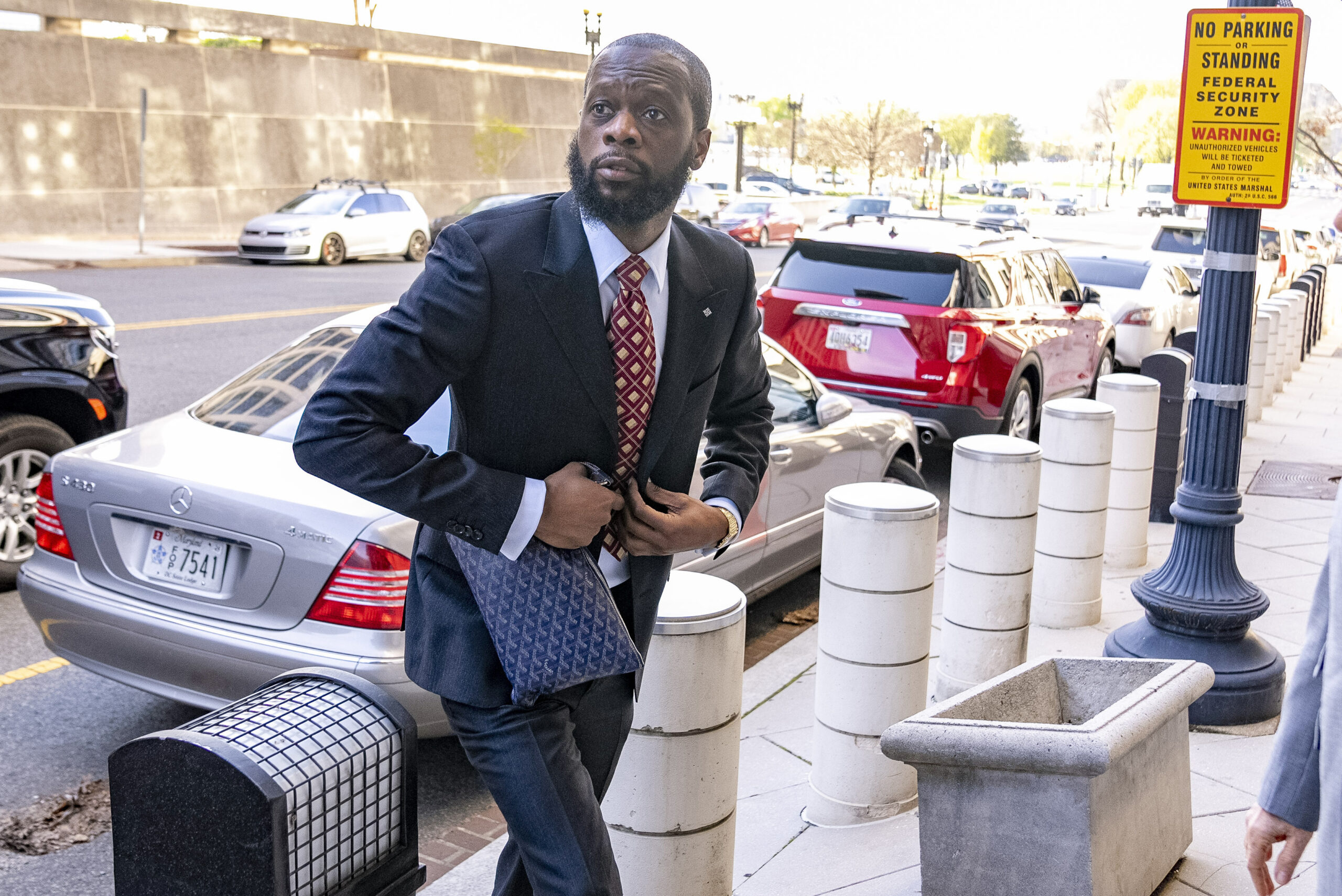 Prakazrel "Pras" Michel, a member of the 1990s hip-hop group the Fugees, arrives at federal court A...