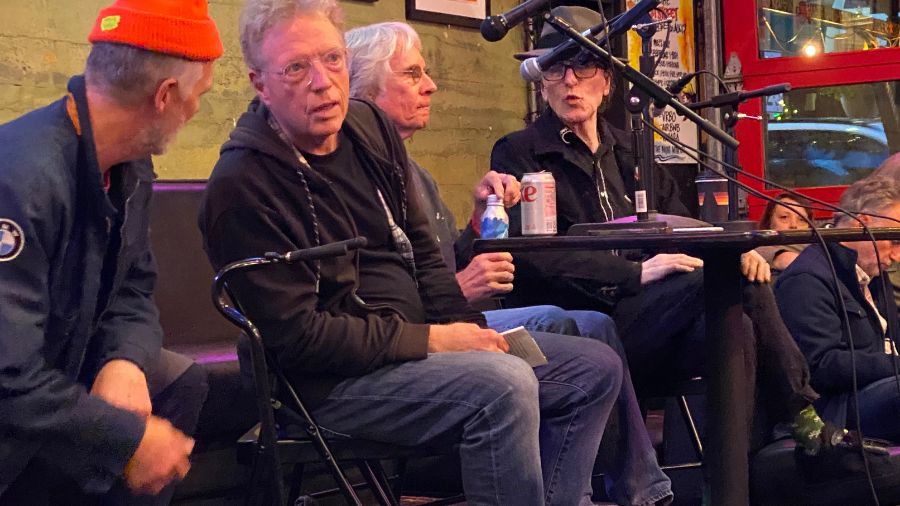 Charles R. Cross, second from left, moderates a panel at Easy Street Records in November 2023. Cros...