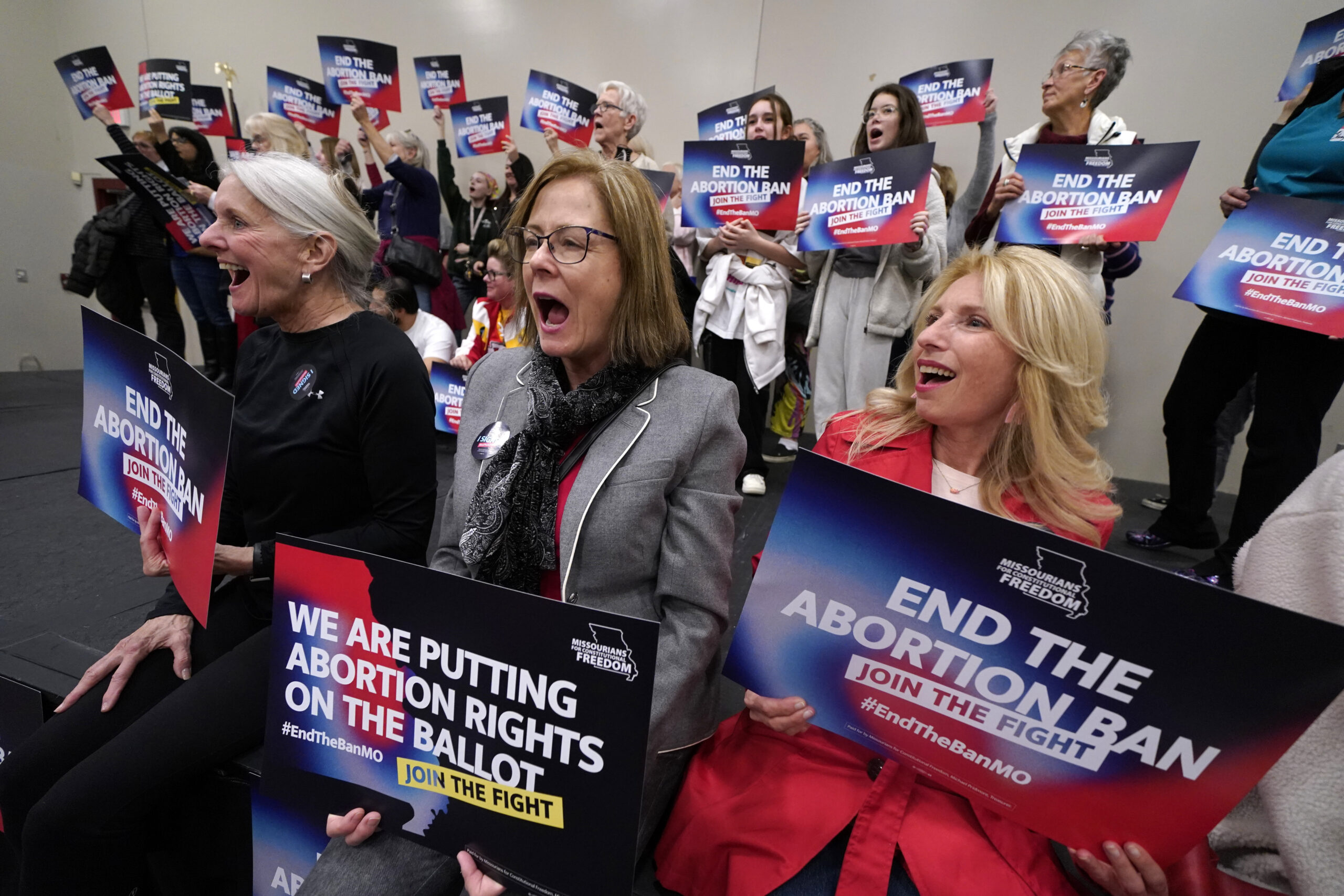 FILE - Missouri residents and pro-choice advocates react to a speaker during Missourians for Consti...