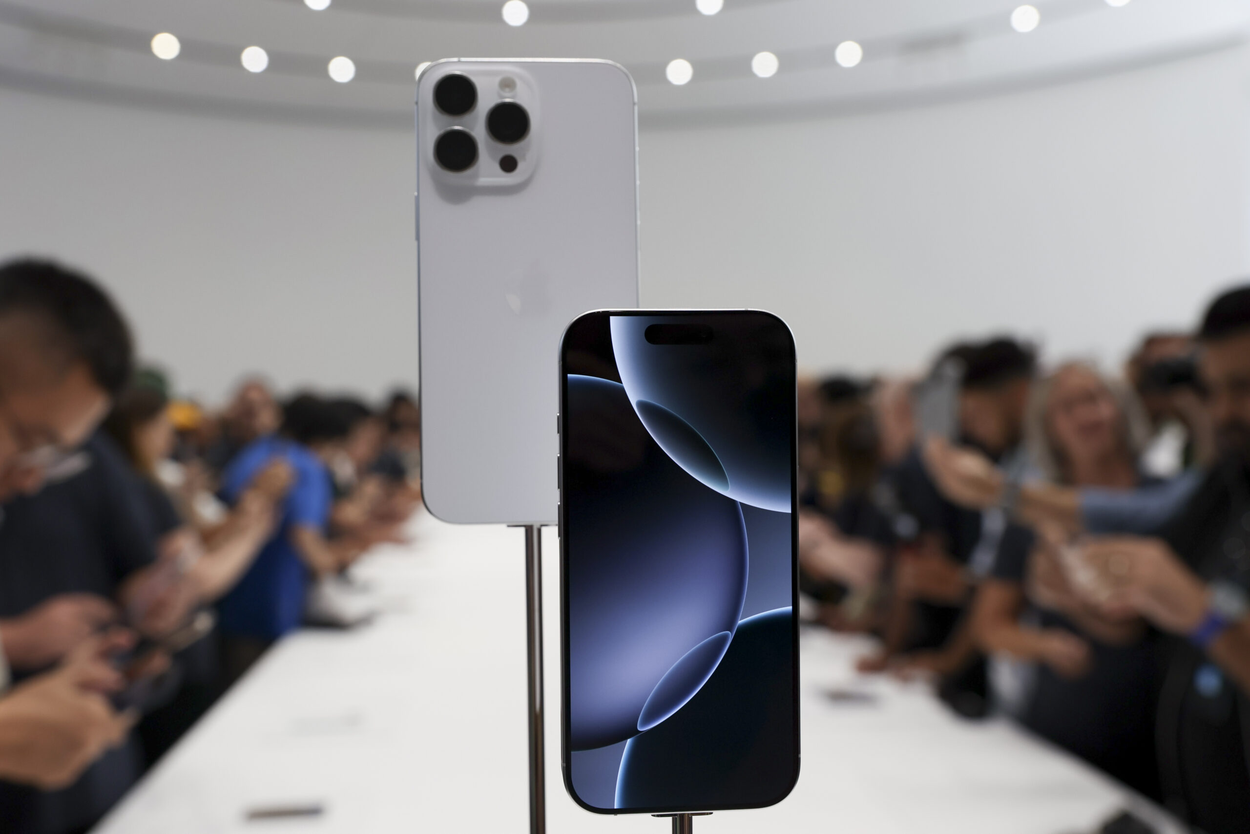 The new iPhone 16 is displayed during an announcement of new products at Apple headquarters Monday,...