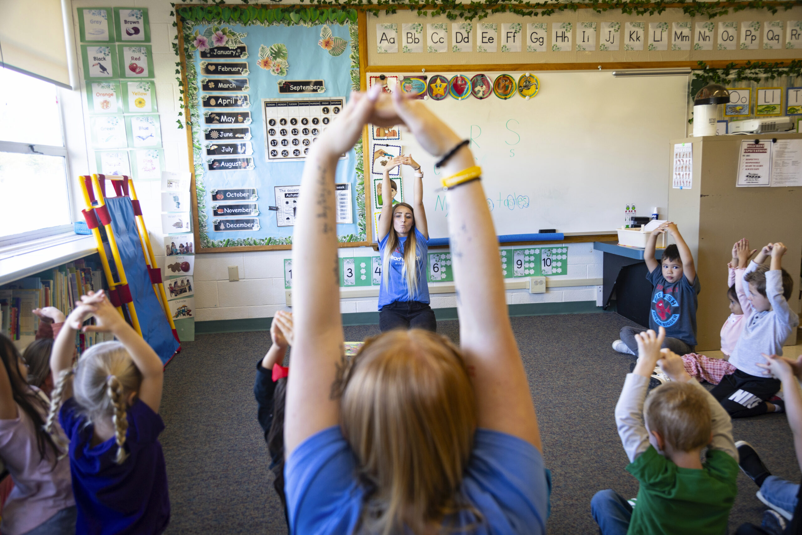 FILE - Teacher Abi Hawker leads preschoolers in learning activities at Hillcrest Developmental Pres...