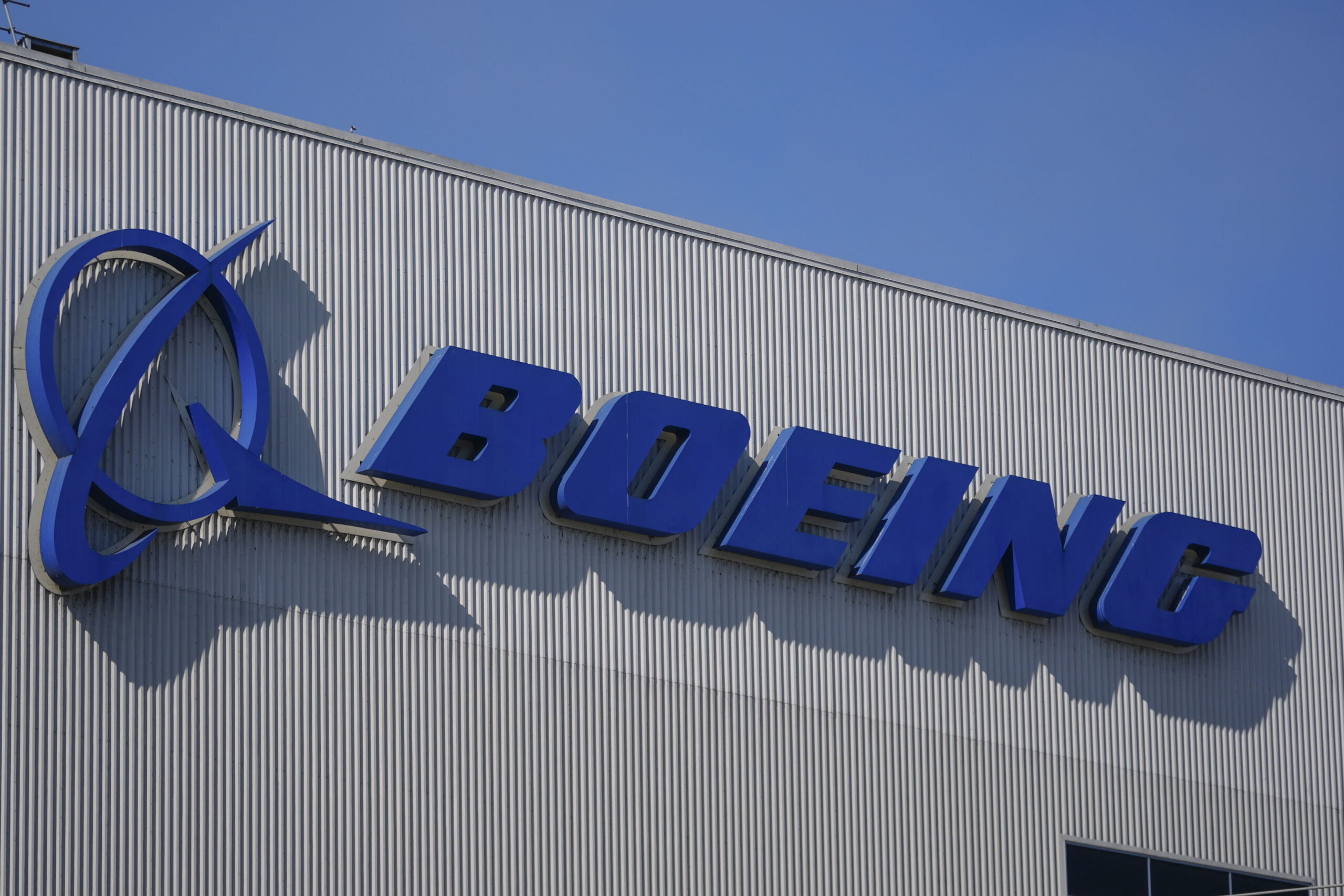 The Boeing logo is displayed at the company's factory Tuesday, Sept. 24, 2024, in Renton, Wash. (AP...