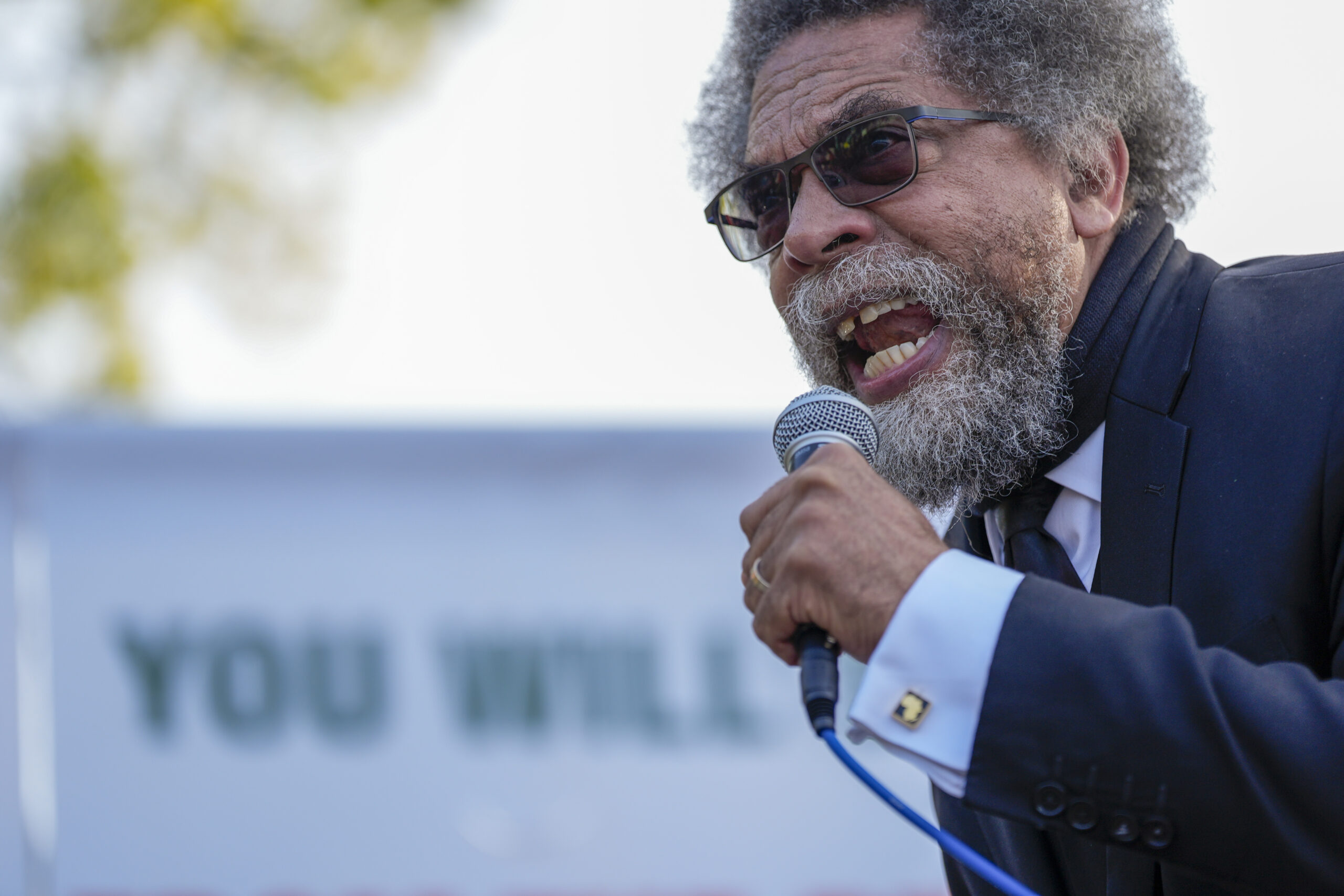 Progressive activist Cornel West speaks at a demonstration in Union Park outside the Democratic Nat...