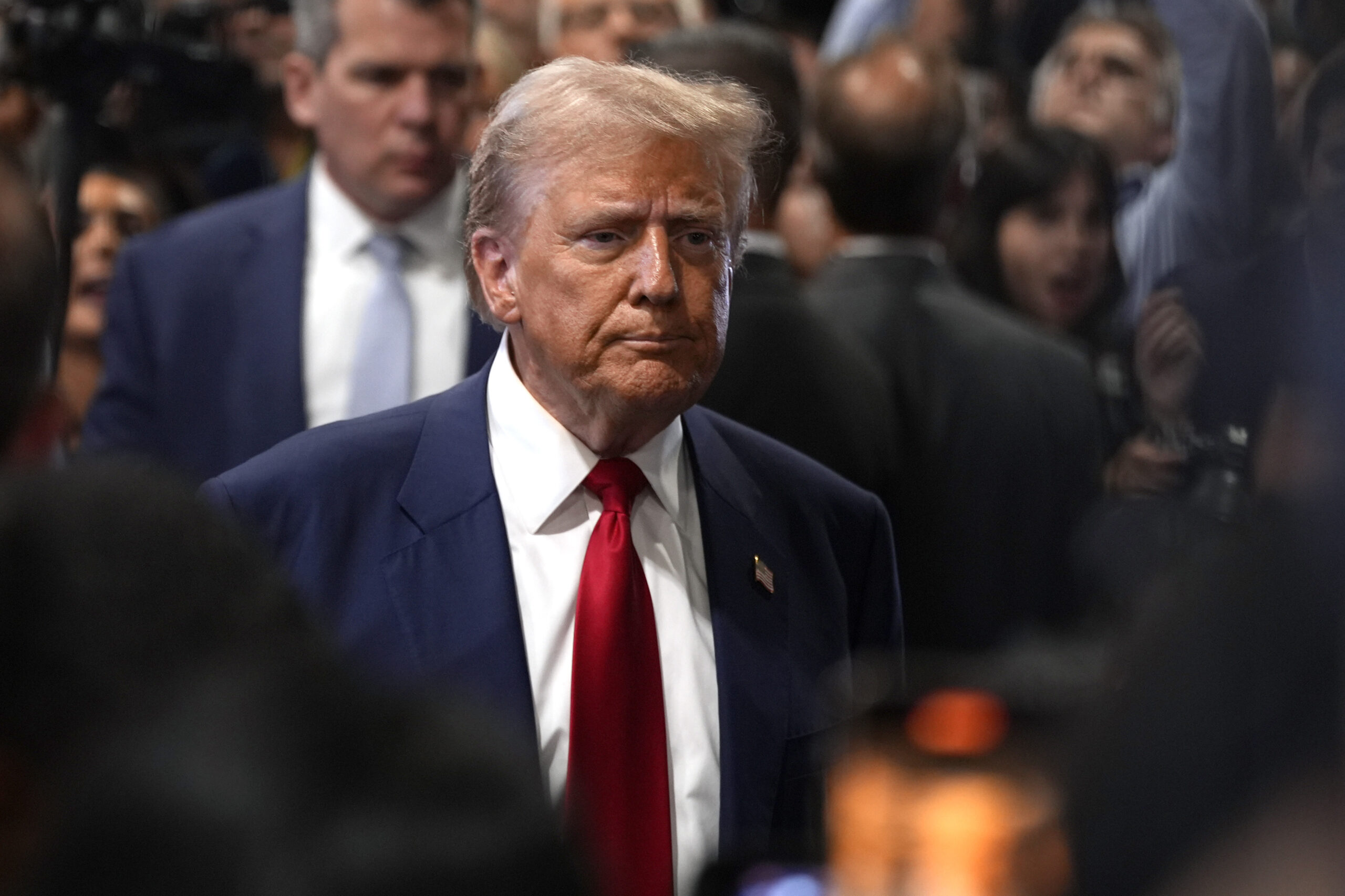 Republican presidential nominee former President Donald Trump speaks to reporters in the spin room ...