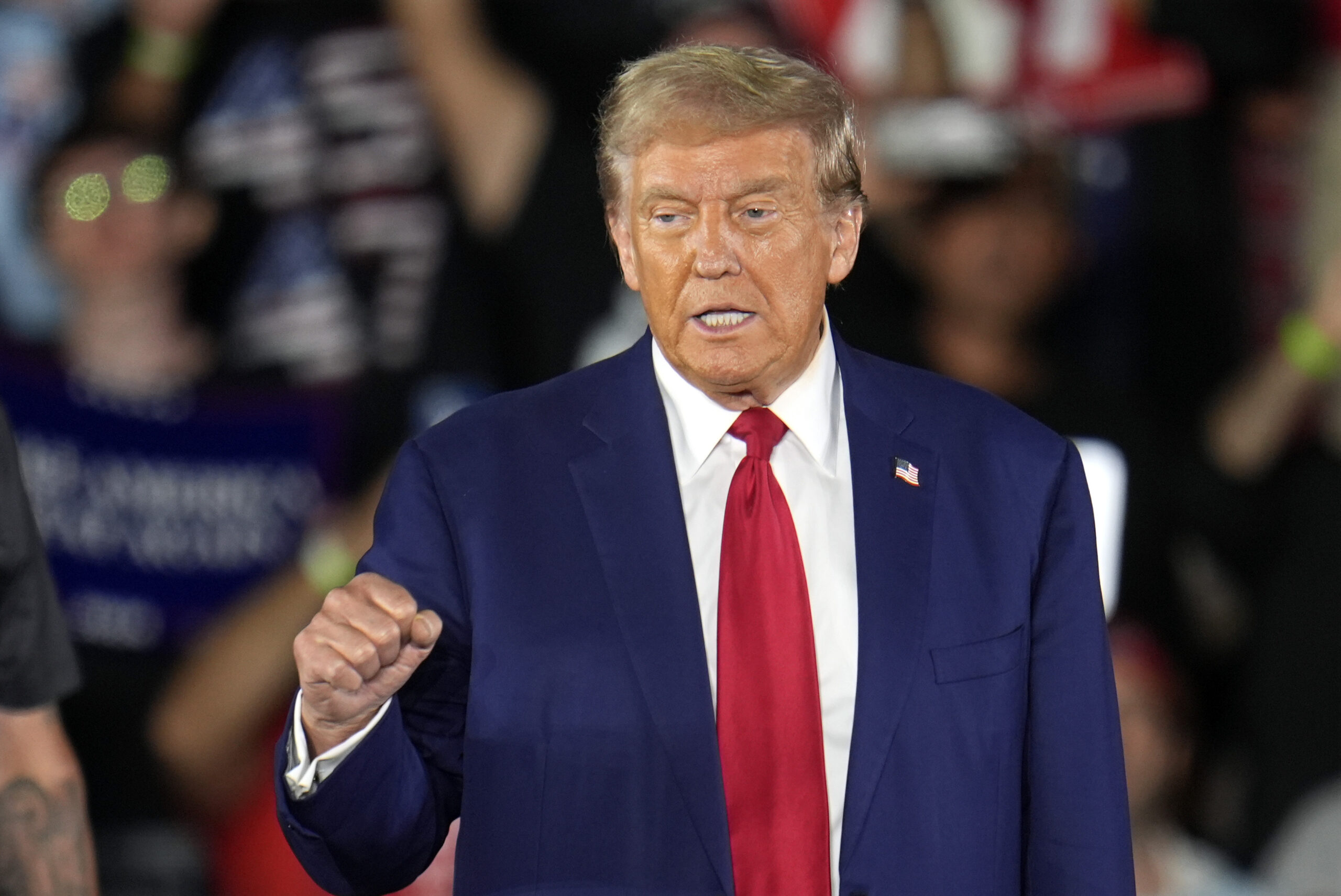 Republican presidential nominee former President Donald Trump arrives for a town hall event at Maco...