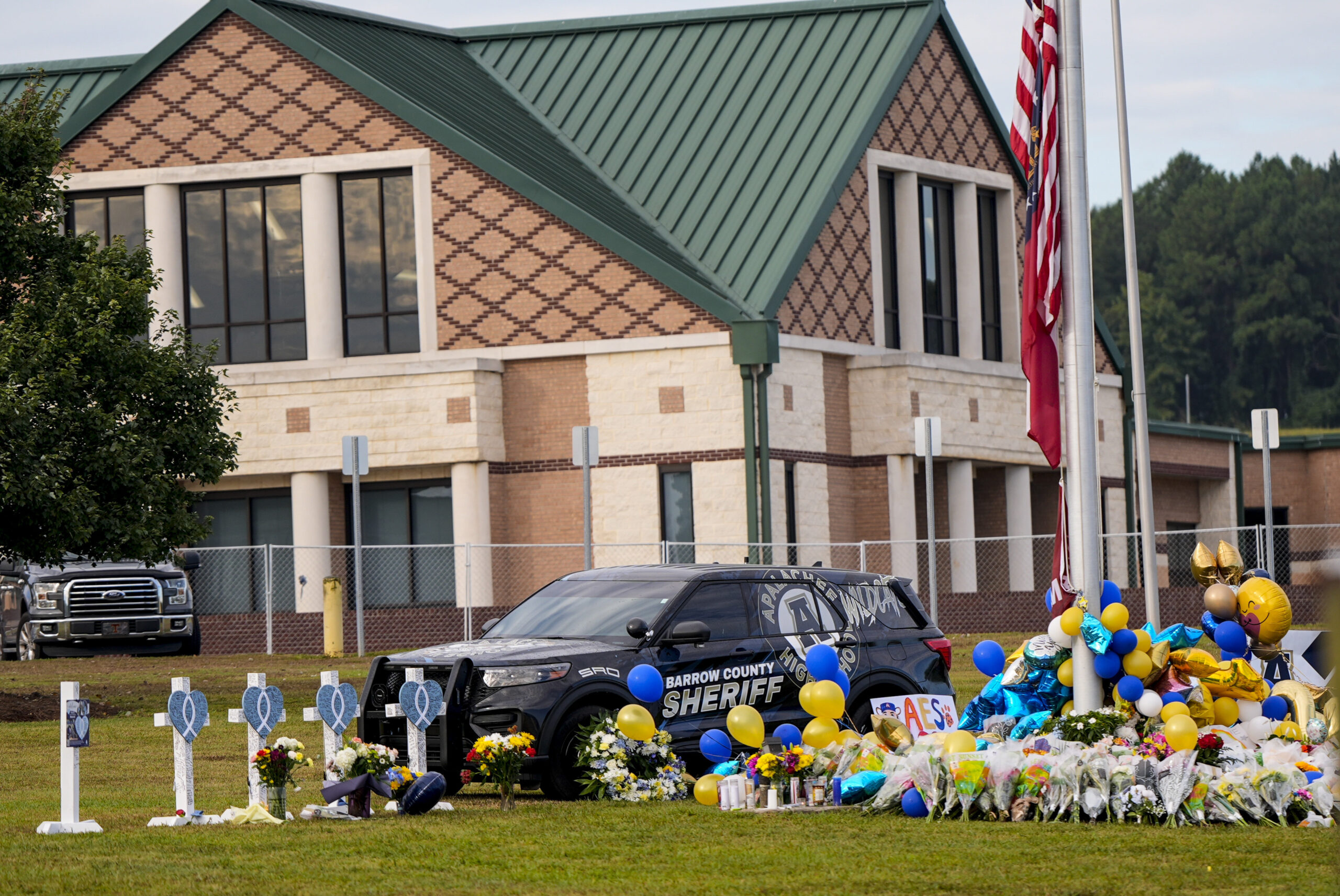 A memorial is seen at Apalachee High School after the Wednesday school shooting, Saturday, Sept. 7,...