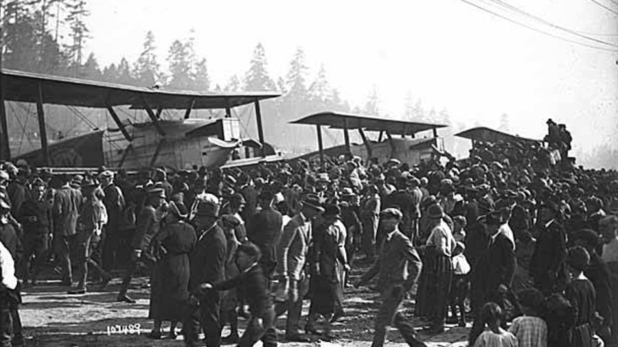 Image: A crowd of 50,000 people welcomed the Douglas World Flyers back to what's now Sand Point Mag...