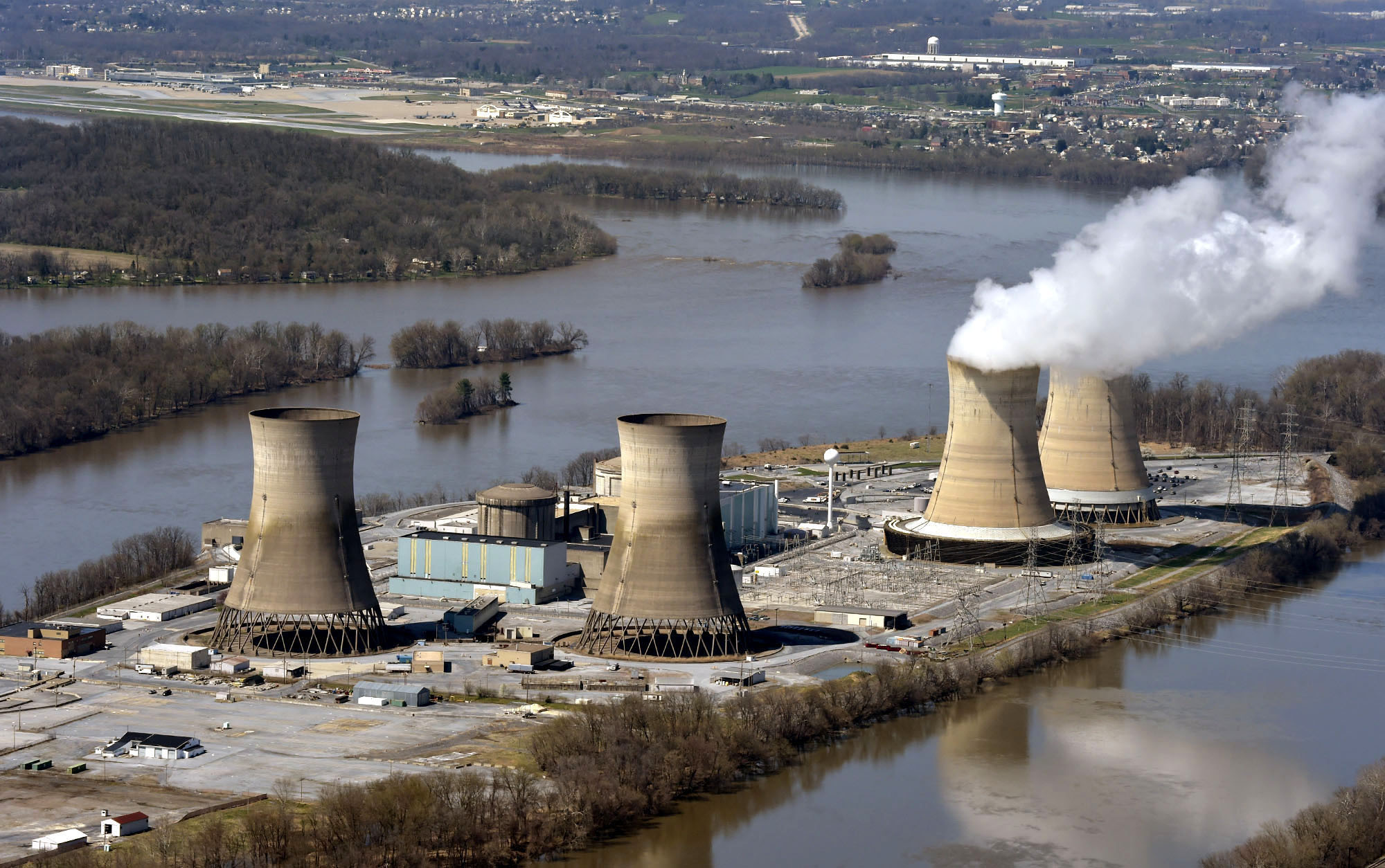 File-This April 18, 2018, file photo shows an aerial view of Three Mile Island, in Dauphin County, ...