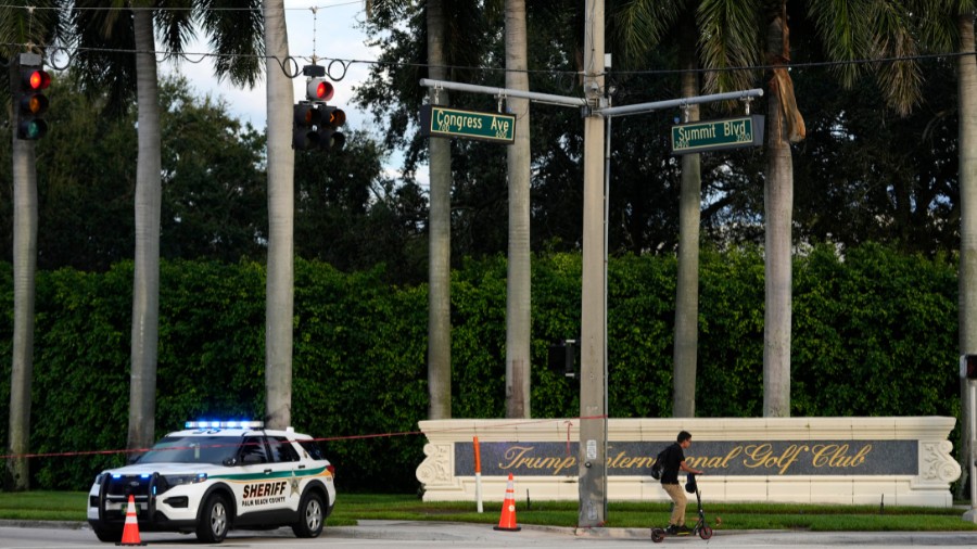 Image: A vehicle with the Palm Beach County Sheriff's office is parked outside of Trump Internation...