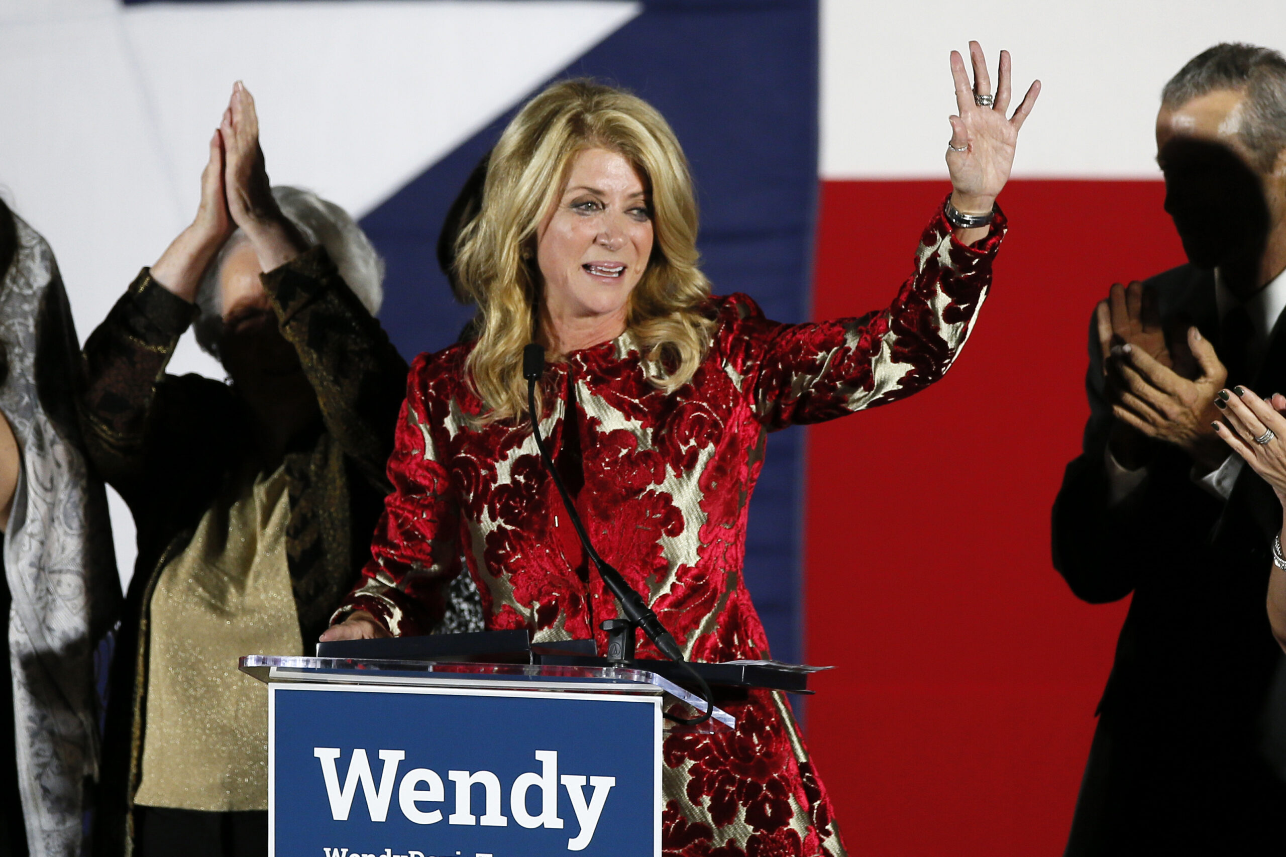 FILE - Then-Texas Democratic gubernatorial candidate Wendy Davis waves to supporters after making h...