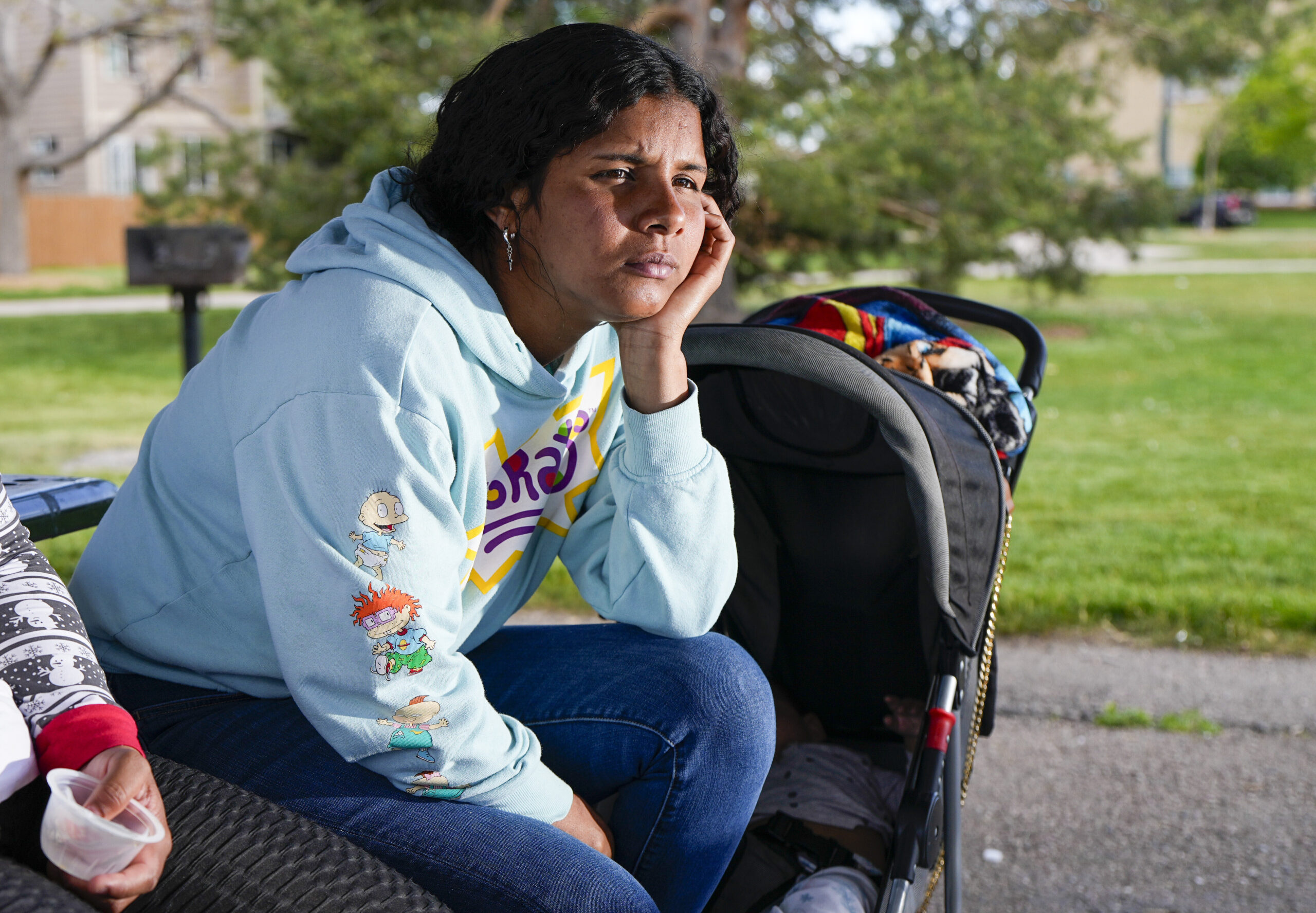 Ivanni Herrera looks on during an interview in a park Friday, May 18, 2024, in Aurora, Colo. (AP Ph...