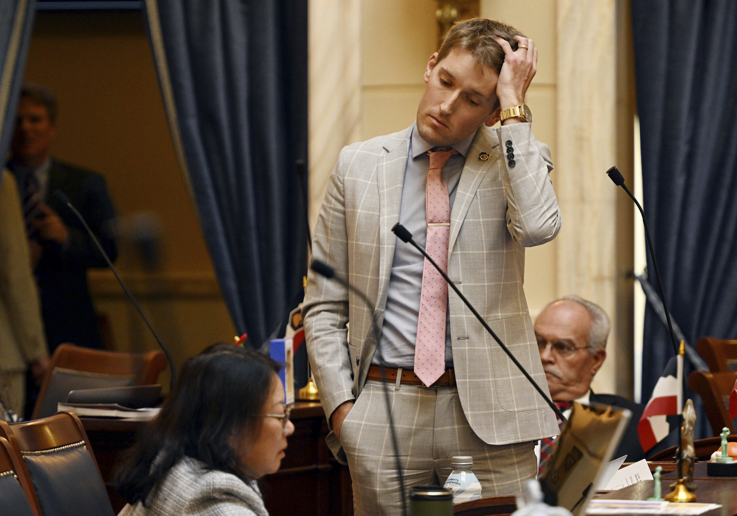 Sen. Nate Blouin, D-Salt Lake City, puts his hand through his hair during discussions in the Senate...