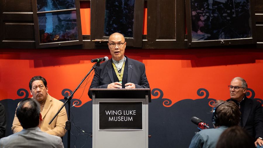 Photo: Wing Luke Museum Executive Director Joel Barraquiel Tan speaks at the unveiling of a new "he...