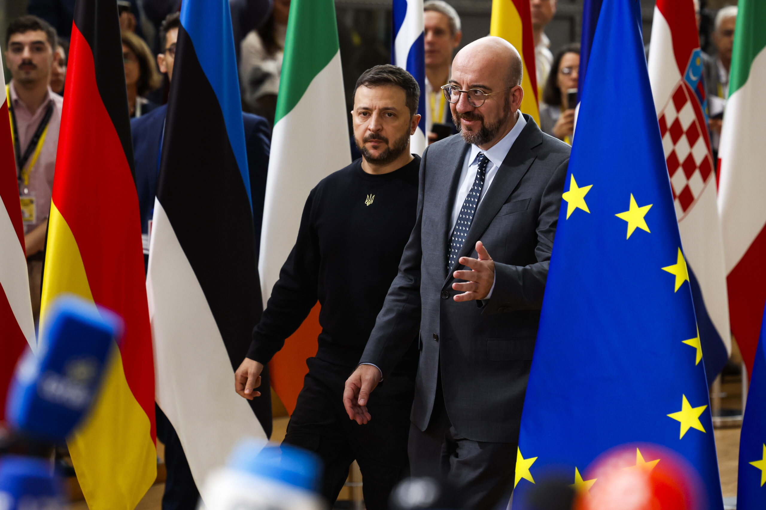 Ukraine's President Volodymyr Zelenskyy, left, and European Council President Charles Michel arrive...