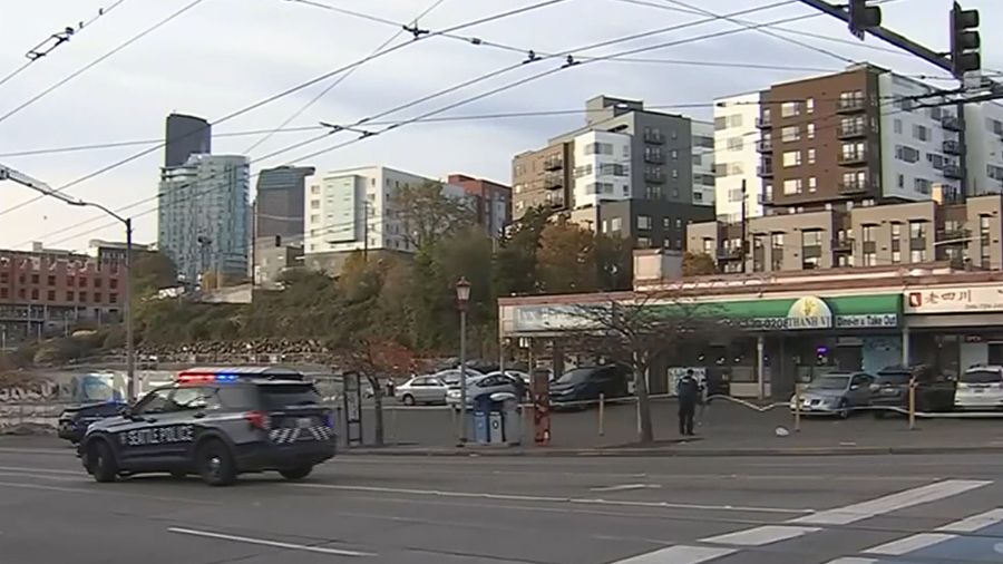 Photo: Seattle police investigate after a mass stabbing in the Chinatown-International District....