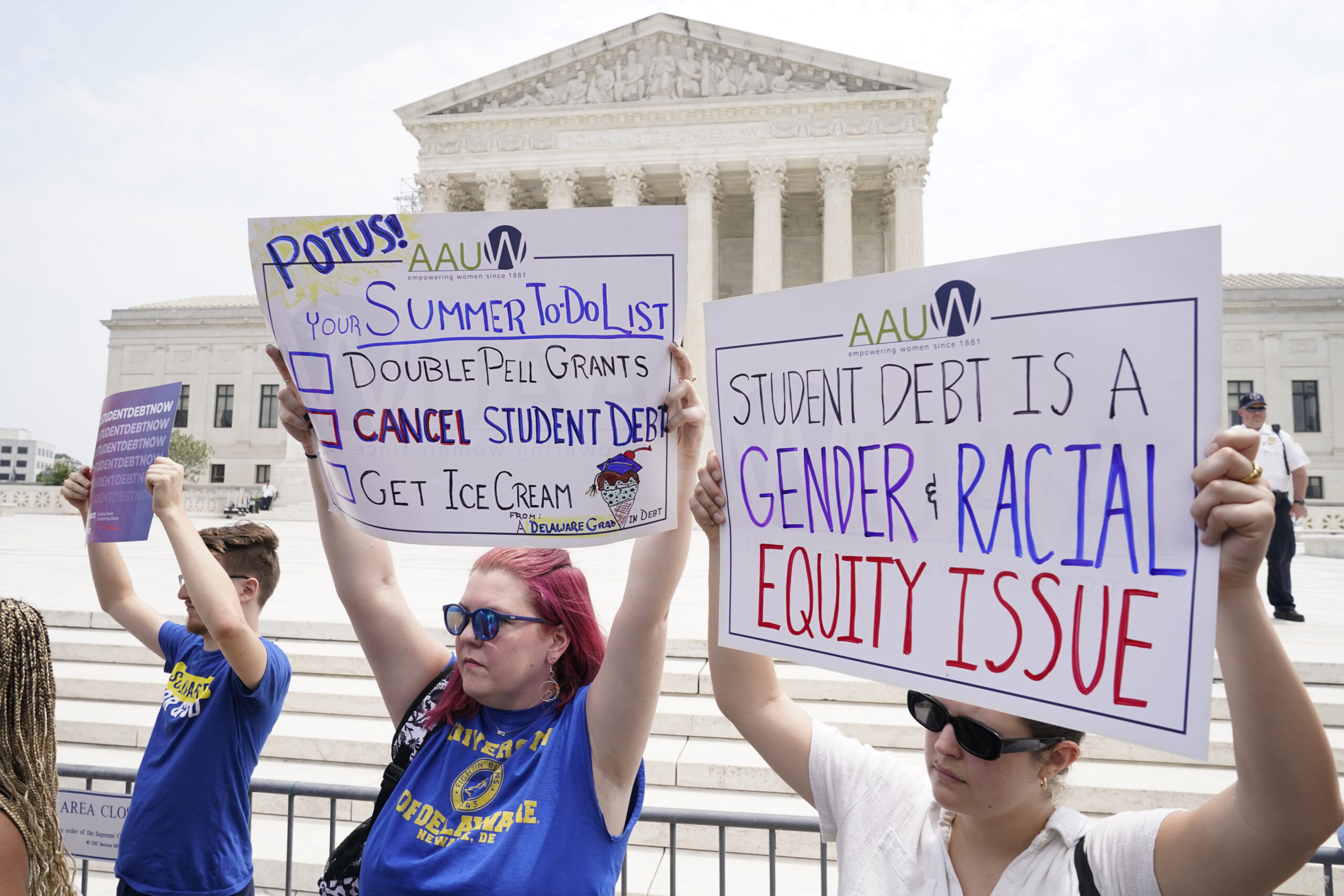 FILE - People demonstrate outside the Supreme Court, June 30, 2023, in Washington. (AP Photo/Jacque...