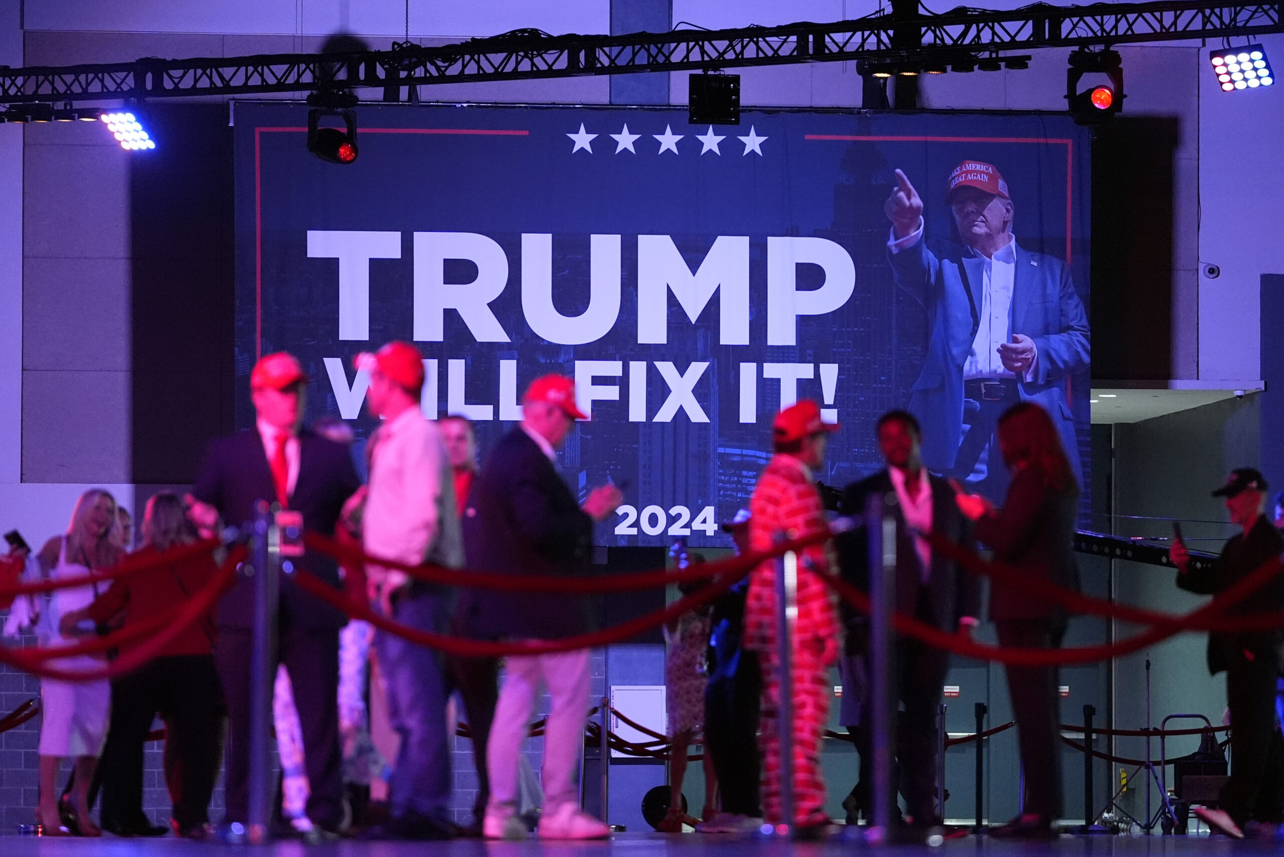 Supporters arrive at an election night watch party for Republican presidential nominee former Presi...