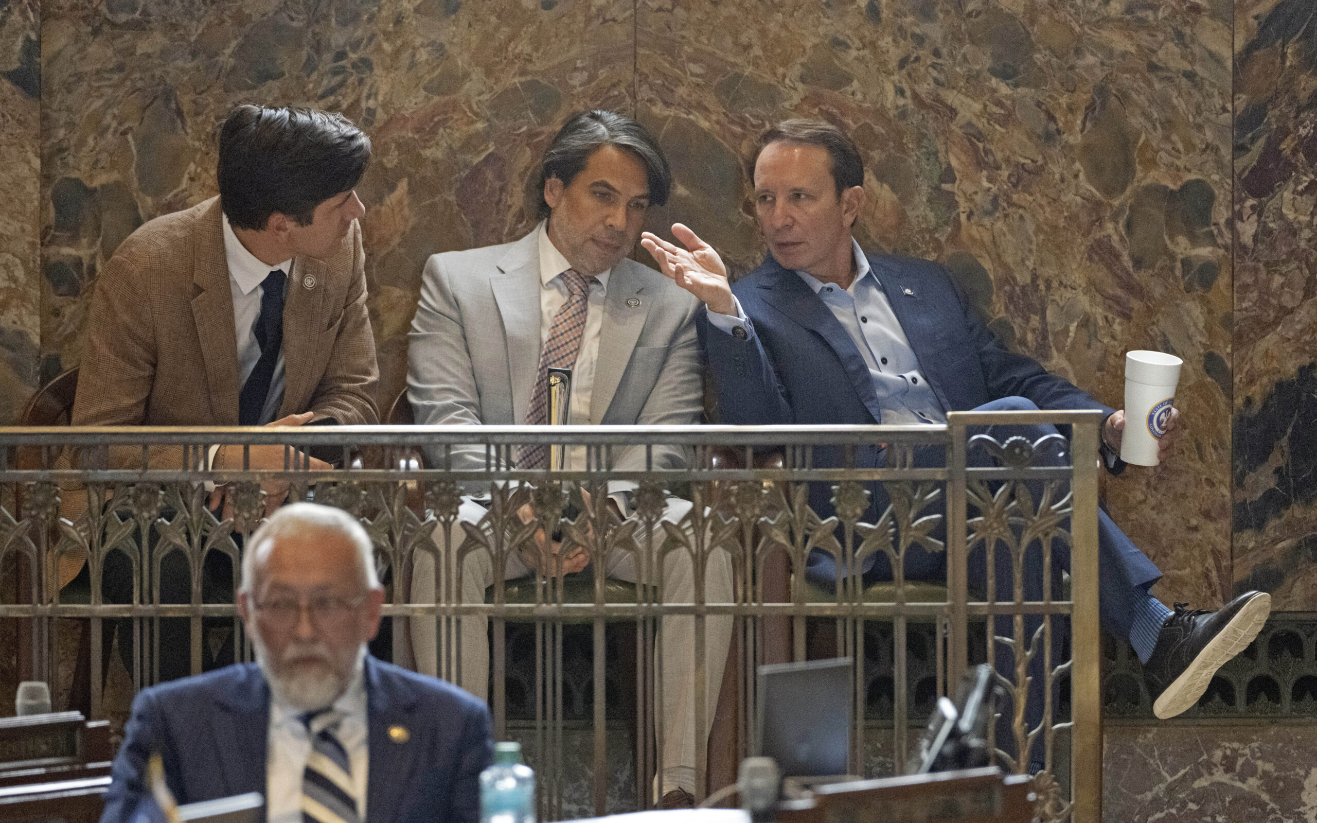 Louisiana Governor Jeff Landry, from right, speaks with his Deputy Chief of Staff, Legislative Affa...